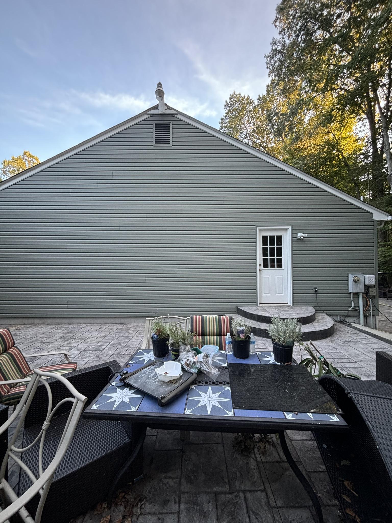 Modern sliding patio doors enhancing a Maryland home’s exterior